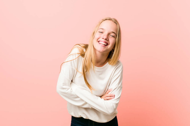 Young blonde teenager woman laughing and having fun. - Foto, afbeelding