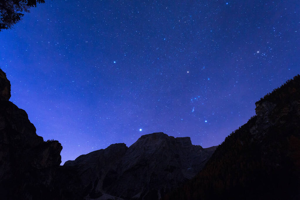 Night sky with stars at Dolomites mountains, Italy - Φωτογραφία, εικόνα