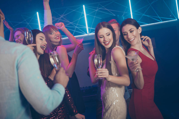 Birthday day occasion holiday event loud sound concept. Photo of excited crazy carefree in short mini dress formal wear ladies guys enjoying wine glass beverage dancing on dj music - 写真・画像