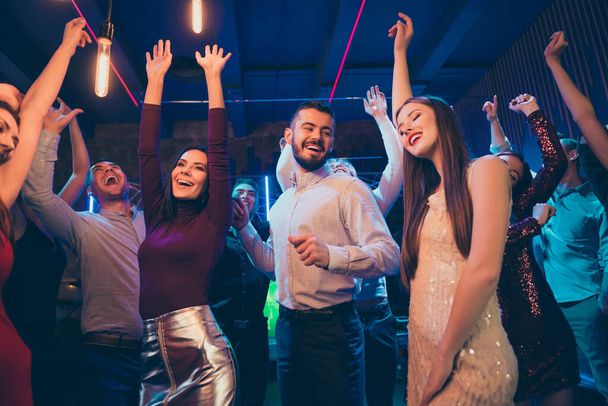 Low angle view photo of positive cheerful buddies celebrate university college graduation event have party dance on discotheque wear formalwear vogue dresses - Zdjęcie, obraz