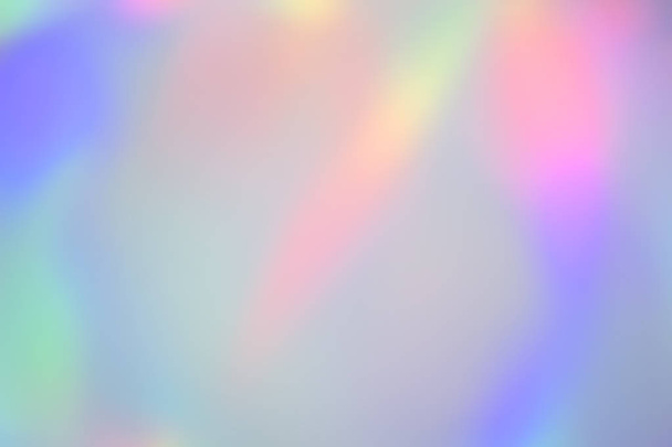 Blurry abstract iridescent holographic foil background - Photo, Image