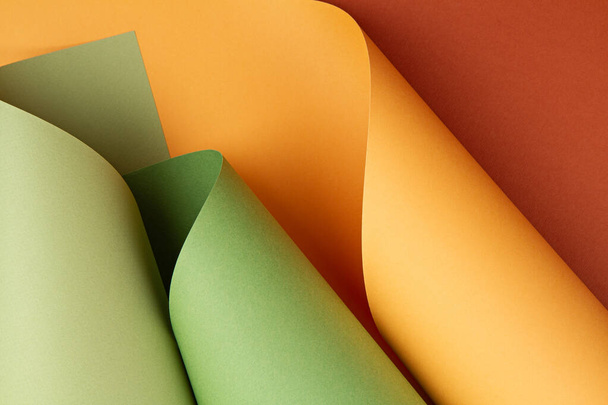 異なる色合いのロール状の質感の紙シートの抽象的な背景 - 写真・画像