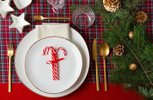 Festive decoration of christmas table for the party. Invitation, christmas celebration, festive dinner concept - 写真・画像