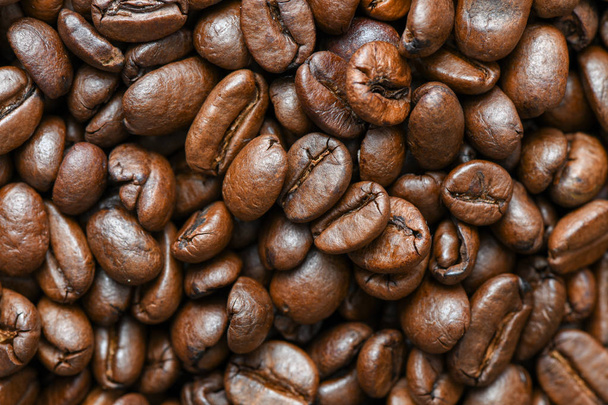 vista de cerca de deliciosos granos de café con textura fresca
 - Foto, Imagen