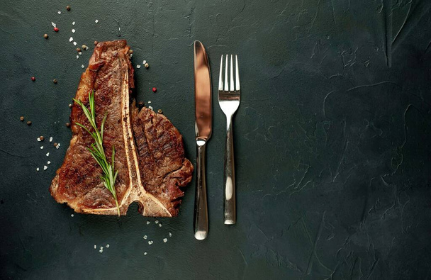 grilled steak and spices on dark background   - Photo, Image