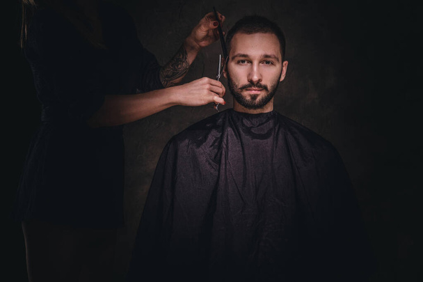Concept of barbershop - male have a hair cut - Photo, Image