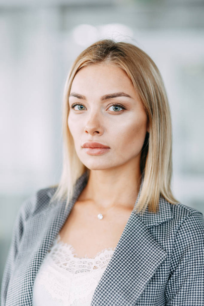 Business style, the situation in the bright office and outside. Business portrait of a beautiful girl on the street.  - Foto, Imagem