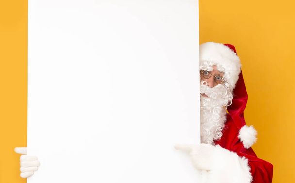 Santa Claus with white blank copy space for Christmas wishes - Photo, Image