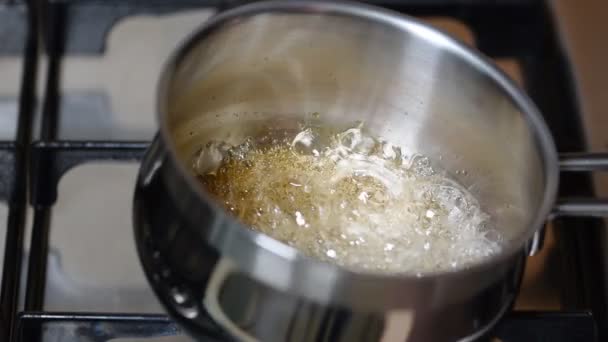 Boiling sugar mixture. Wet Caramelization. Making Golden Syrup Series. - Footage, Video