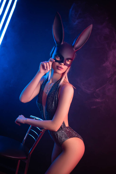 sexy girl in bodysuit and rabbit mask - Foto, afbeelding