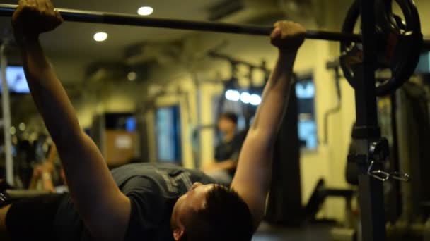 Portrait of muscular Asian man training in gym, Body weight workout - Felvétel, videó
