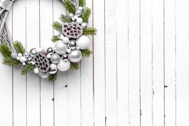 Christmas wreath on wood background - Foto, immagini