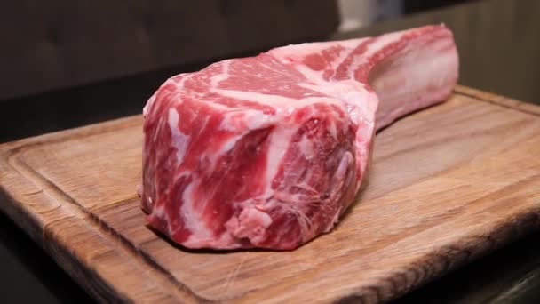 Raw fresh meat Ribeye Steak. Meat for steak. Beef steak. Raw meat.  - Materiaali, video