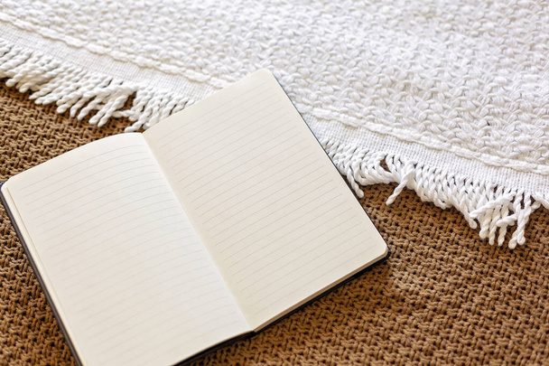 My love diary - The daily journal. Personal diary on knitted woolen textile. Keeping a Diary or Journal recording everyday thoughts - Photo, Image