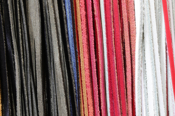 many strings of leather - Фото, изображение