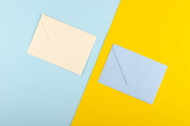 Paper envelope composition on blue background. Flat lay. - Foto, immagini
