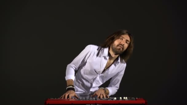 The guy plays the synthesizer - Footage, Video