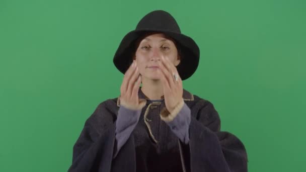 Žena kouzelník dělat obličejový výraz - Záběry, video