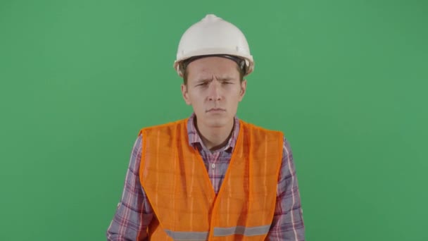 Adult Man Engineer Looking Suspicious At Camera - Materiał filmowy, wideo