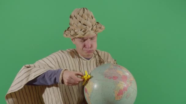 Adult Man Peasant Flying Airplane On Globe - Filmagem, Vídeo