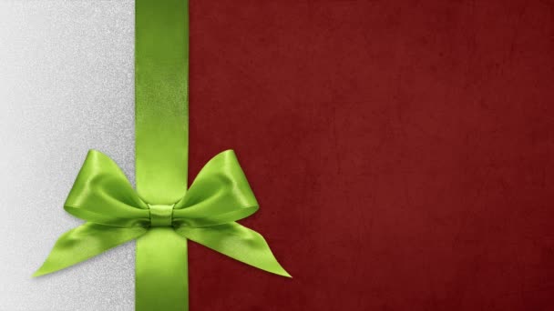 Frohe Weihnachten Geschenk-Karte, Schleifen ändern Farben isoliert auf Weihnachten glänzende Hintergrundvorlage mit Kopierraum - Filmmaterial, Video