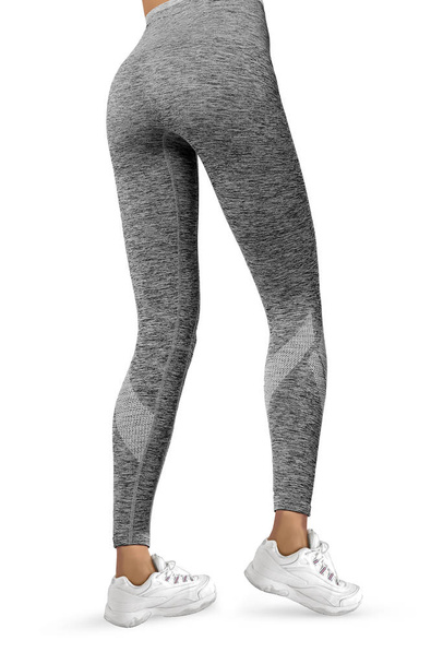 Beautiful slim female legs in grey sport leggings and running shoes isolated on white background. Concept of stylish clothes, sports, beauty, fashion and slim legs - Foto, Bild