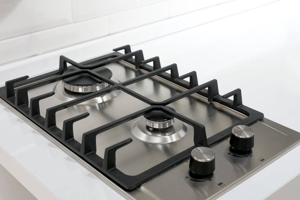 modern stainless steel silver gas stove with black elements - Zdjęcie, obraz