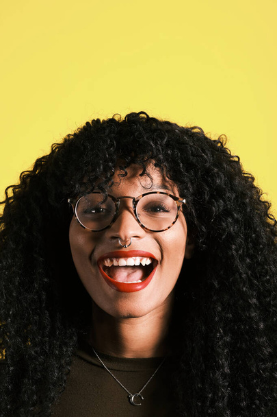 young african american with afro hairstyle, eyeglasses and yellow background - Photo, Image