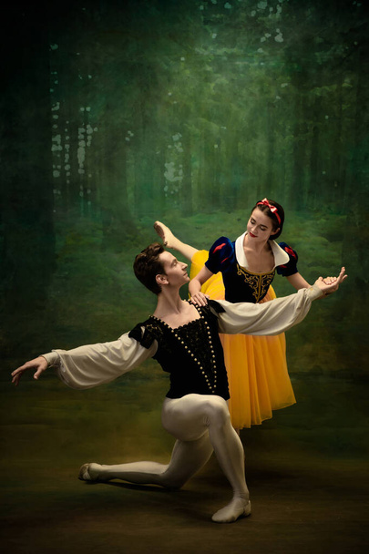 Young ballet dancers as a Snow Whites characters in forest - Foto, Imagem