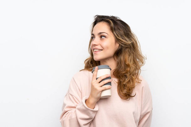 junge blonde Frau mit Kaffee zum Mitnehmen - Foto, Bild