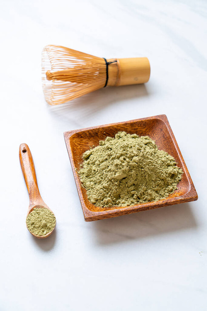 matcha green tea powder with whisk - Foto, Imagem