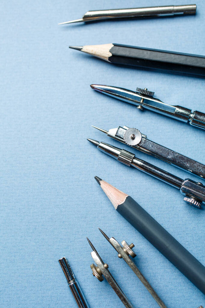 Drawing tools are arranged on a blue background - Photo, Image