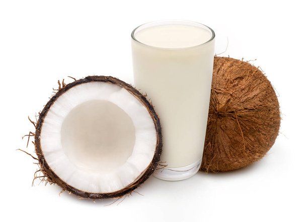 Coconut milk with fresh whole nut and half isolated on a white b - Фото, зображення