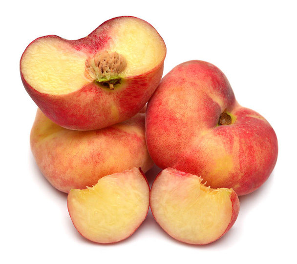 Peach saturn fruit whole and half isolated on white background.  - Photo, Image