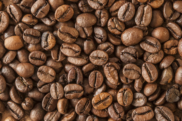 geröstete Kaffeebohnen, können als Hintergrund verwendet werden - Foto, Bild