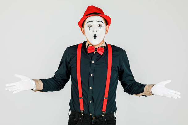 Close-up portrait of a clown, MIME, on a white background. - Photo, Image