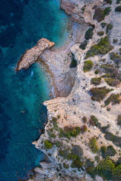 Aerial view of the coastline and yachts on the island of Ibiza during sunset. - Φωτογραφία, εικόνα