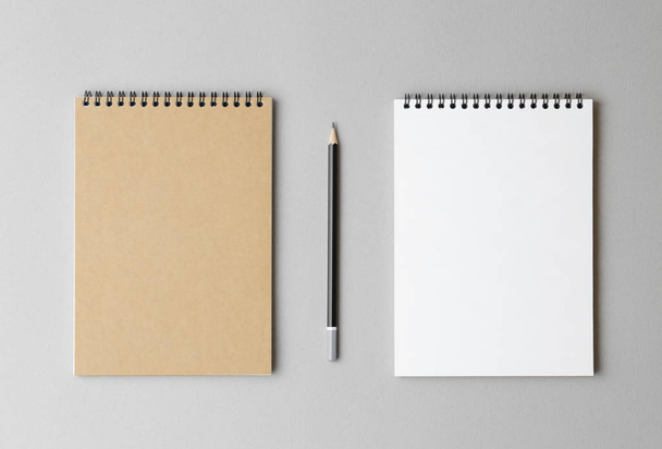 top view of a open notebook with pencil on a gray background - Foto, immagini