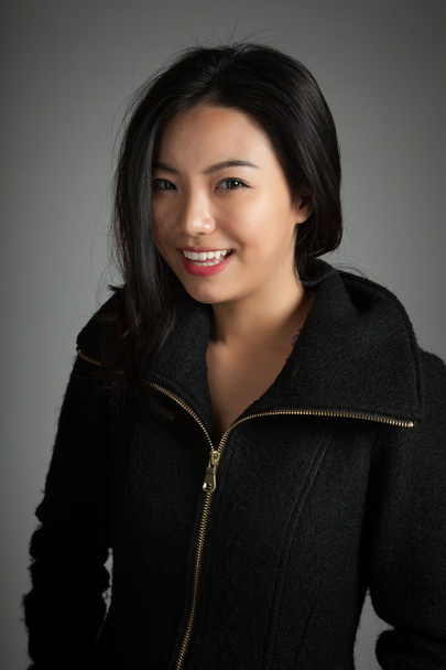 Attractive asian girl posing in studio - Foto, afbeelding