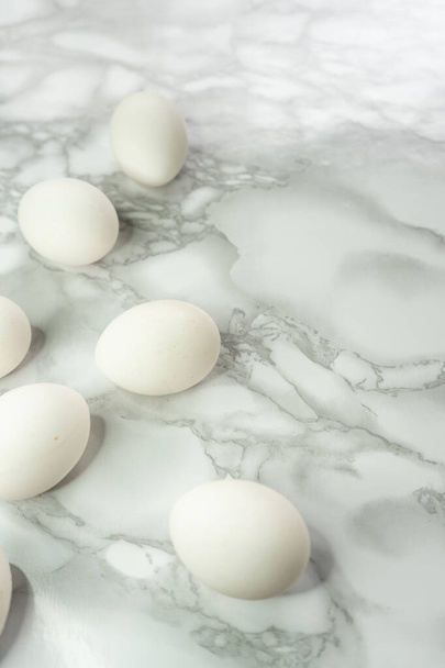 white raw eggs without packaging, whole and neat - Photo, Image