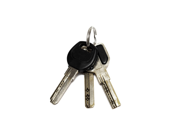 Куча ключей на белом фоне
 - Фото, изображение
