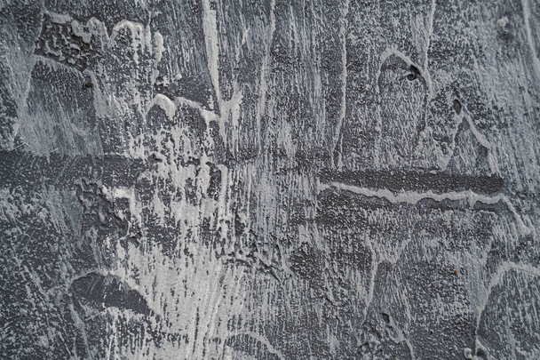 textura de hormigón de fondo con muchos arañazos rasguños de manchas de pintura y golpes. color gris
. - Foto, Imagen