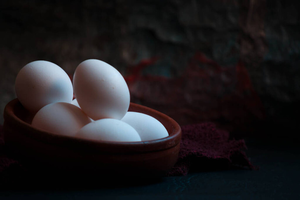Eggs in a brown bowl - Photo, Image