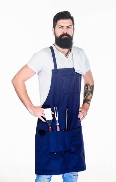 Tips cooking meat. Tools for roasting meat outdoors. Picnic and barbecue. How choose meat for steak. Professional barbecue utensil. Bearded hipster wear apron for barbecue. Roasting and grilling food - Foto, afbeelding