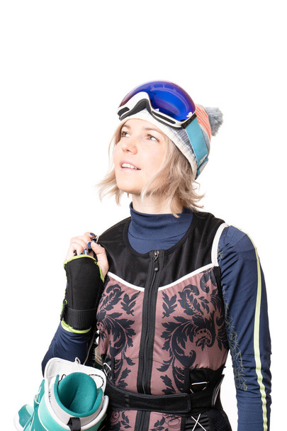 Portrait of a young woman with snowboard boots and glasses isolated on white background - Photo, Image