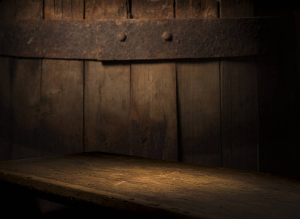Old wooden barrel on a brown background - Photo, Image