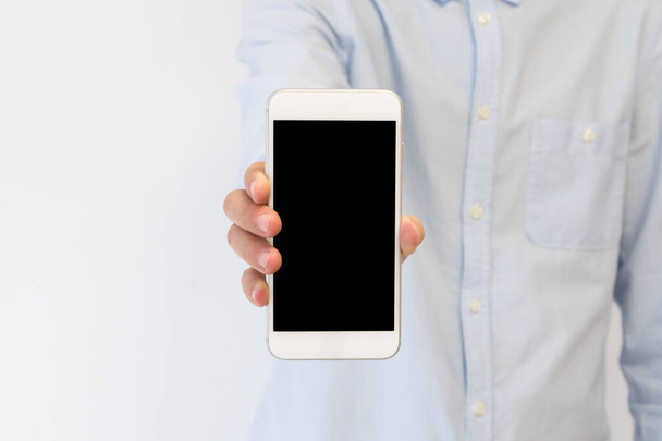 businessman showing phone screen mockup - Photo, image