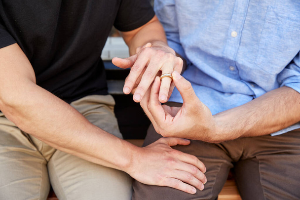 Close Up Of Man Proposing To Male Partner With Ring - Foto, imagen