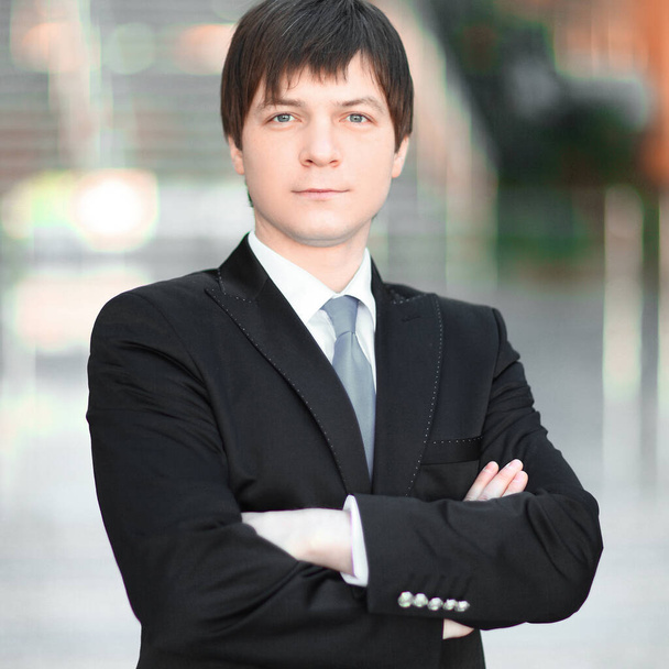 portrait of successful businessman on blurred background office. - Fotó, kép