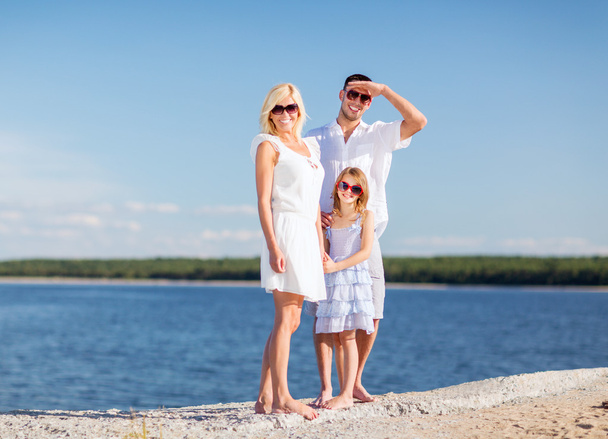 Happy family with blue sky - Fotografie, Obrázek